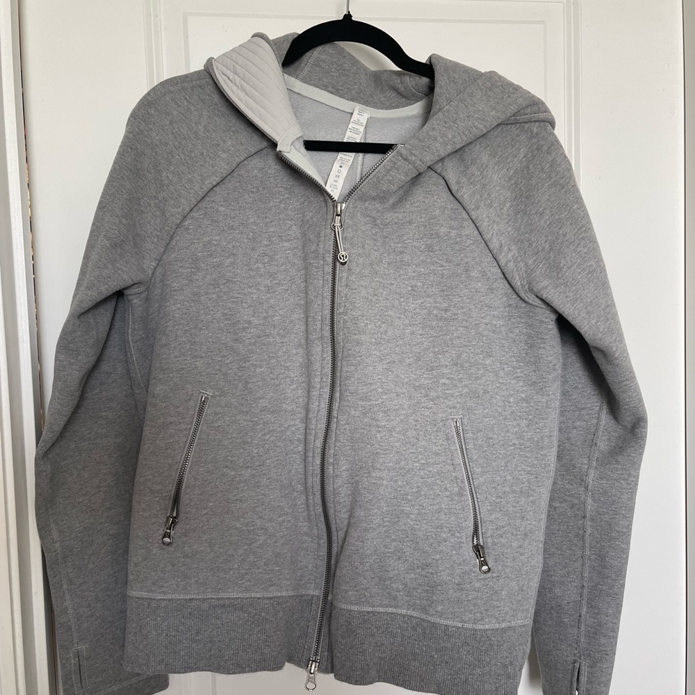 Lululemon gray hoodie size 12, zipper pockets, hole for thumbs.